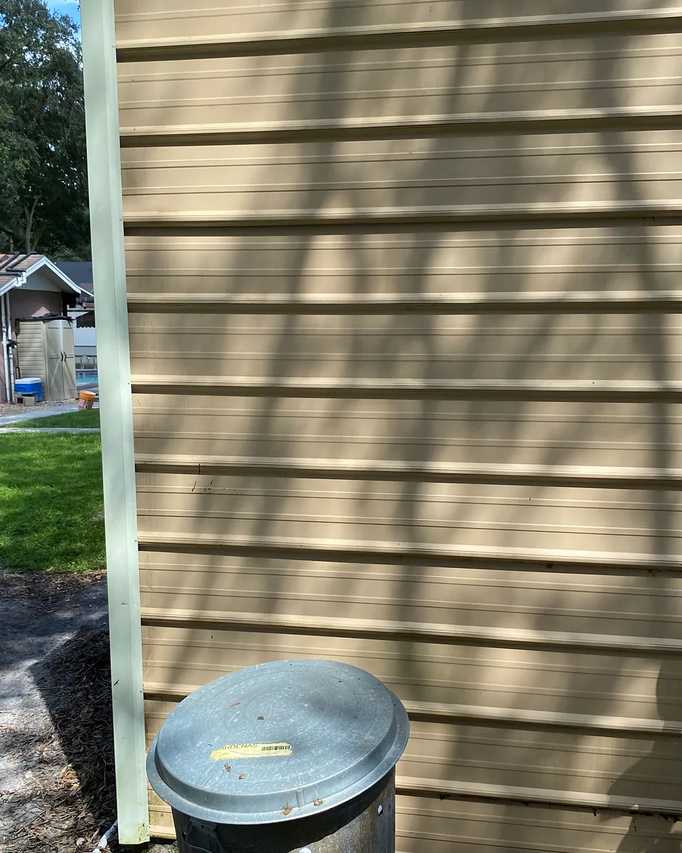 The same house exterior detail after washing.